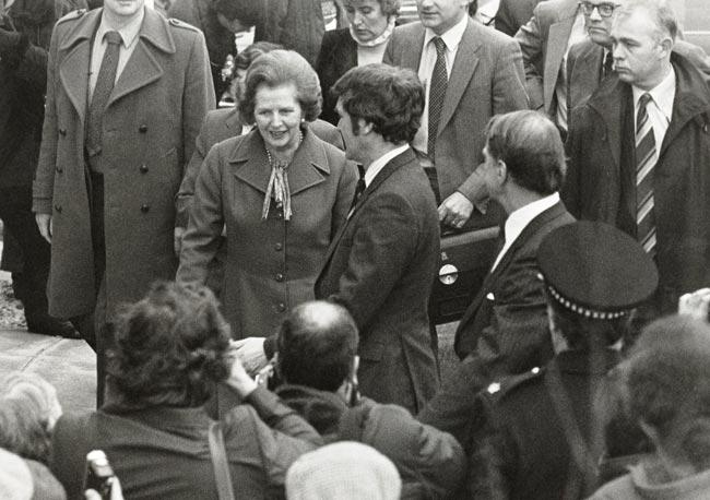 De University of Salford Press Office - Margaret Thatcher visit 1982, CC BY 2.0, 